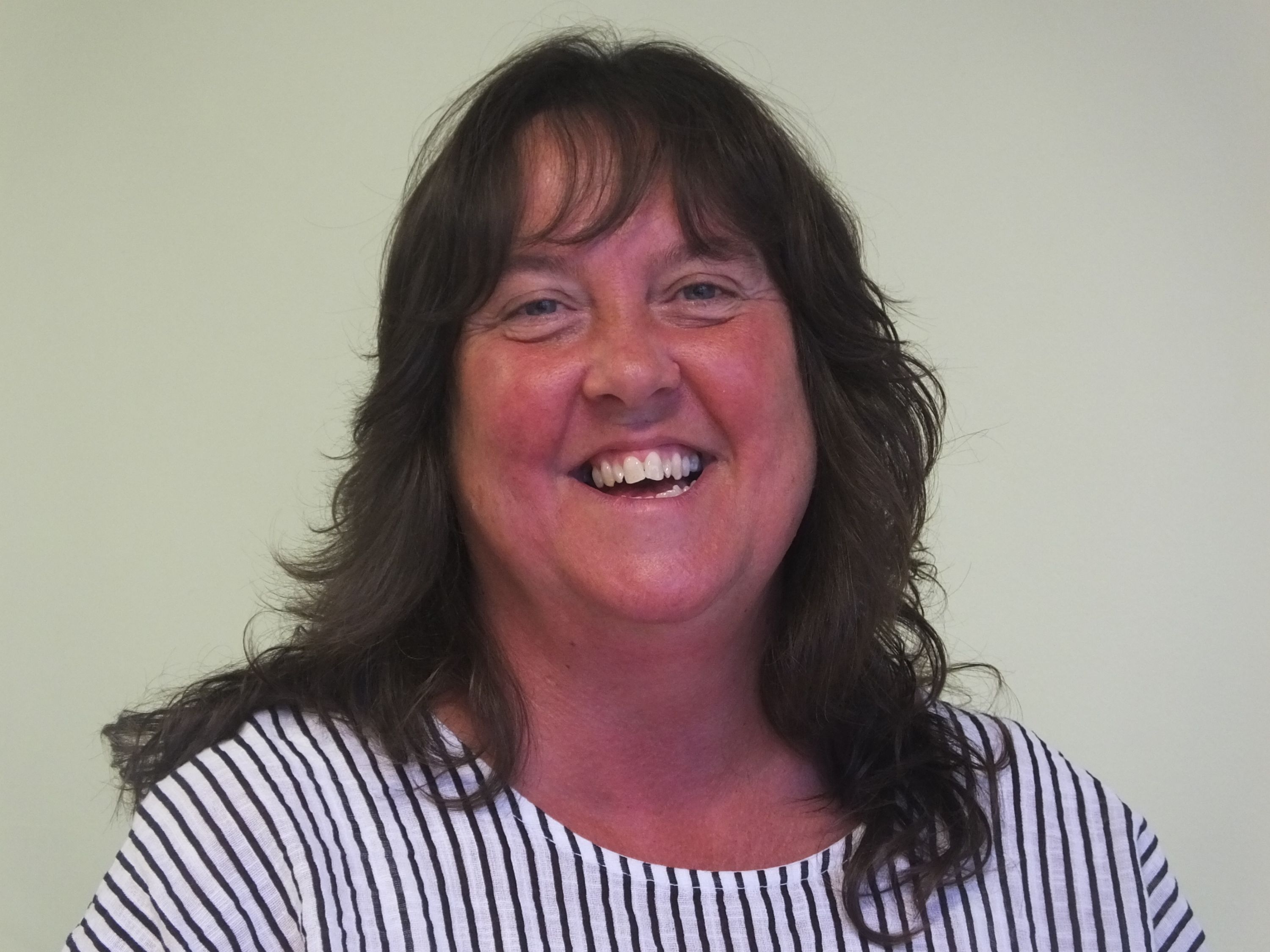 A picture of the PSA, Lee Woodman, smiling.