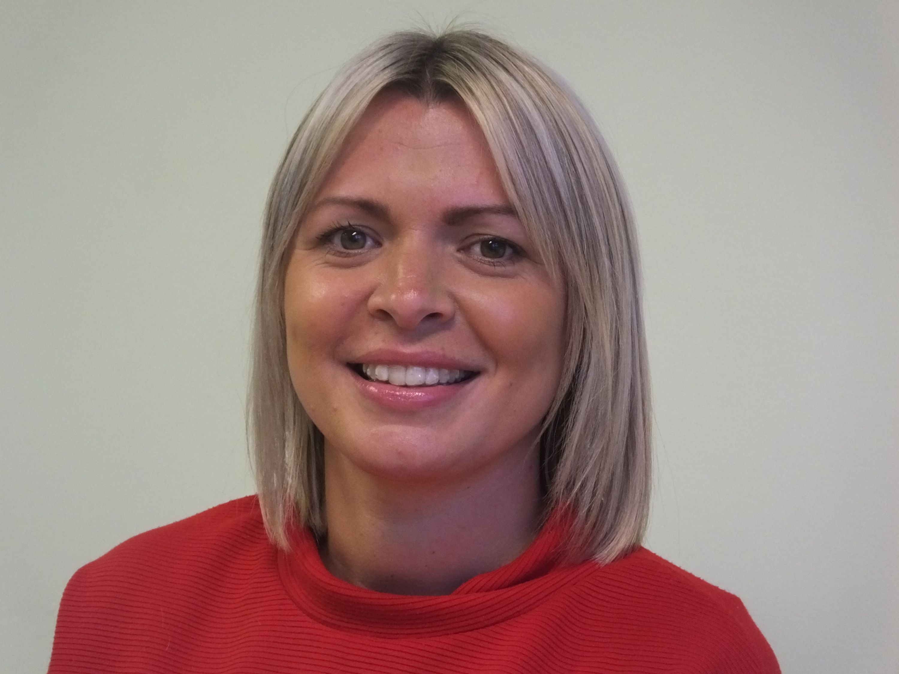 Miss Stapleton smiling 